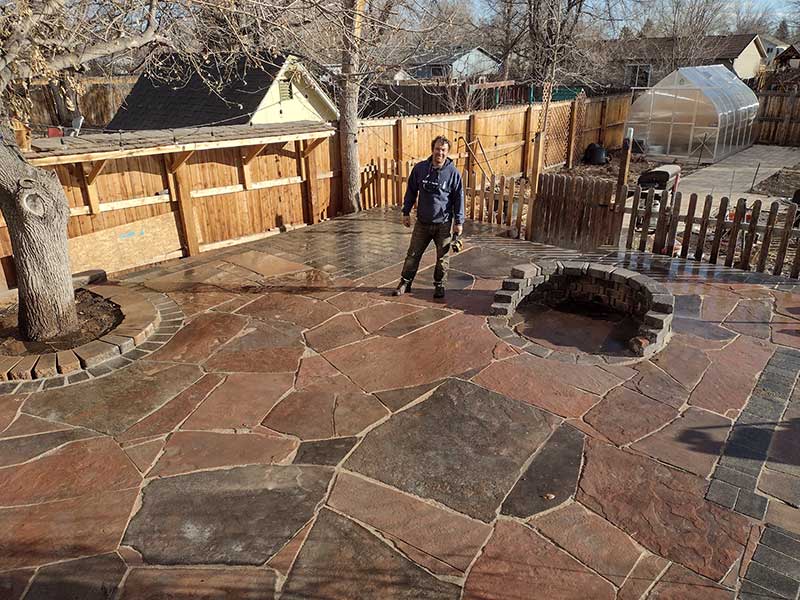 THIS GORGEOUS FLAGSTONE PATIO CREATES SO MUCH MORE USABLE OUTDOOR SPACE